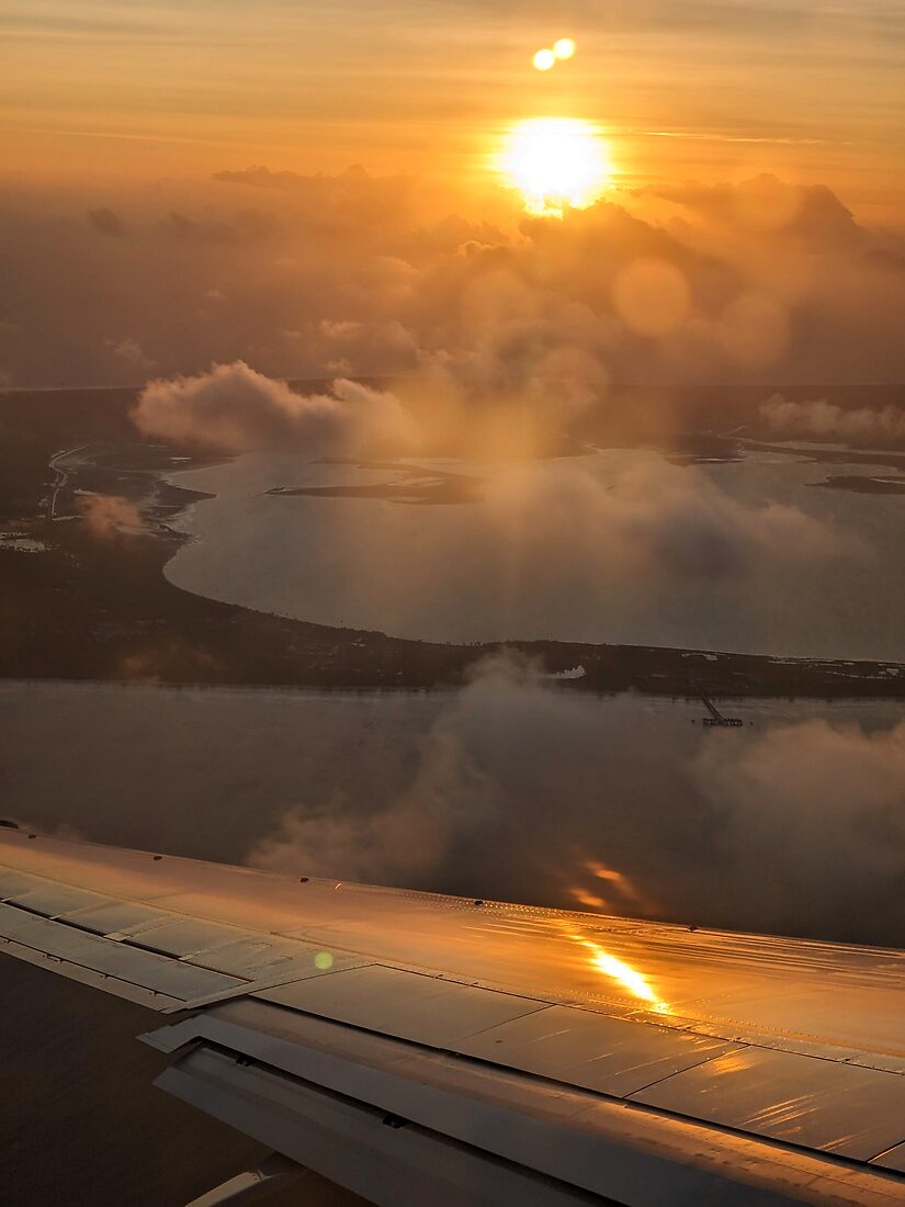Sunset over the wing while leaving Kiribati